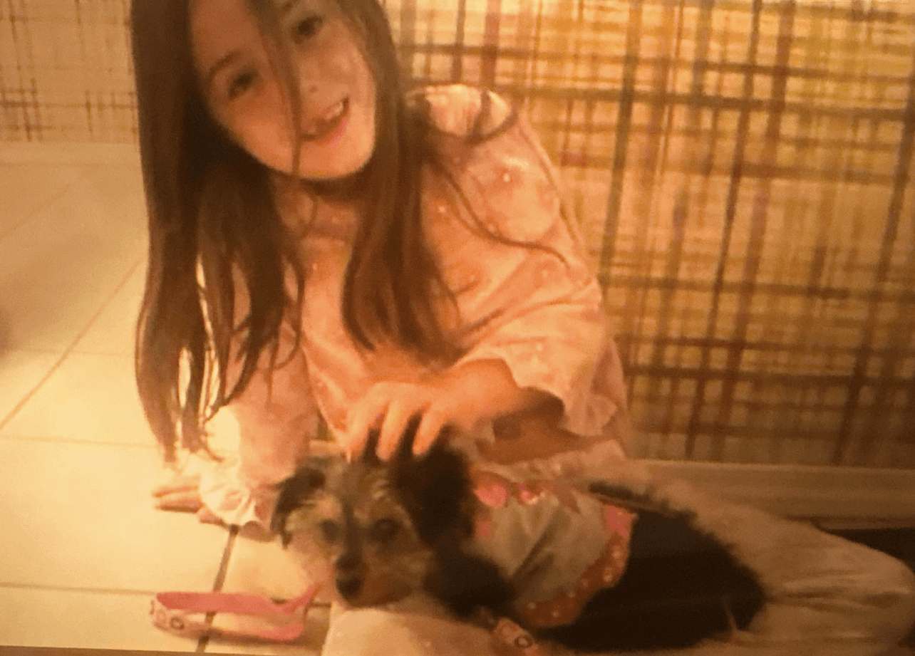 Young Cayman with puppy Gypsy Belle